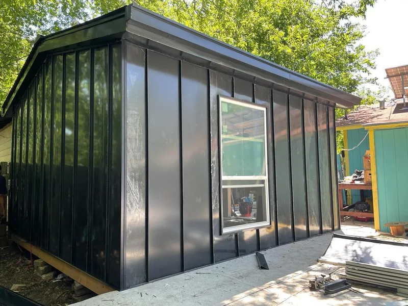 Black standing seam metal wall panels for Roof Inspection in Temecula