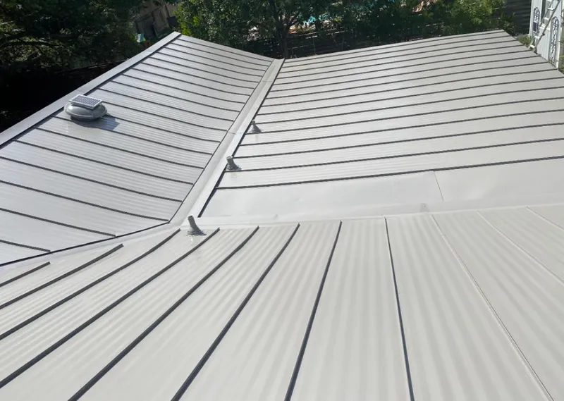 Solar attic fan installed on a metal roof for Roof Ventilation in Temecula
